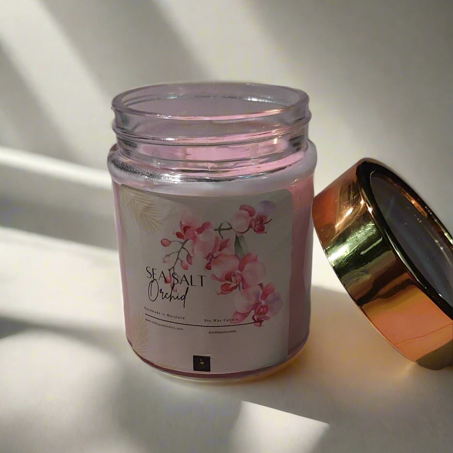 Jar of sea salt with a floral label on a light background
