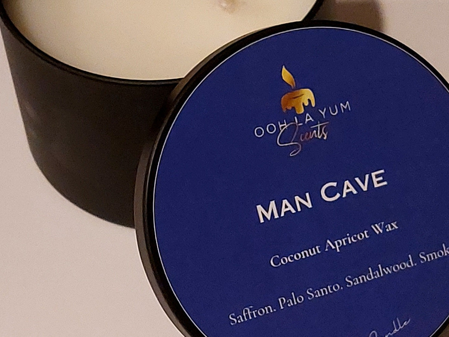 Man Cave candle. A black 8 oz jar.