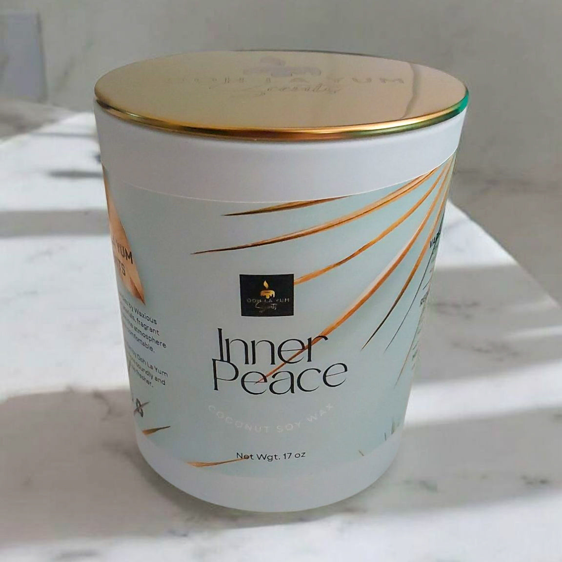 Hand-poured coconut-soy candle with citrus and floral scent