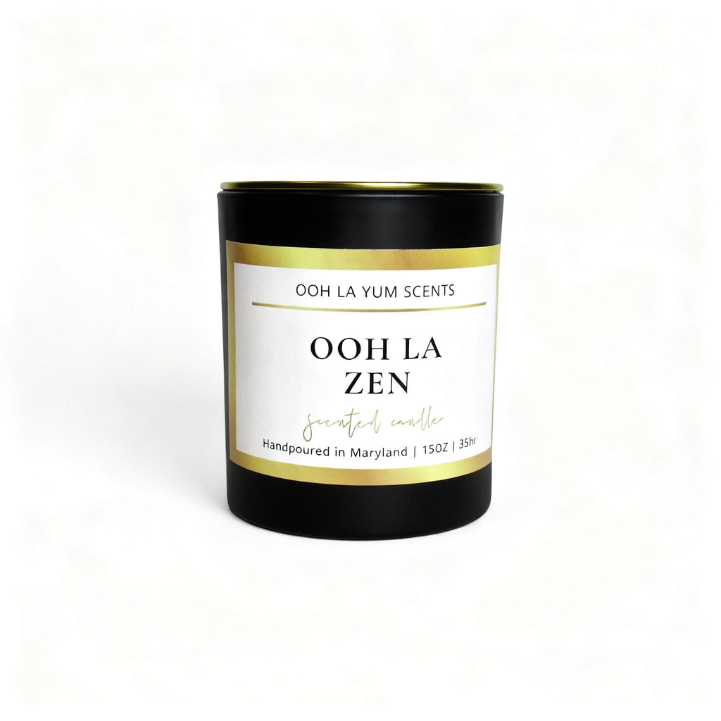 Candle with 'Ooh La Zen' branding on a white background