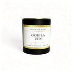 Candle with 'Ooh La Zen' branding on a white background
