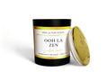 Ooh La Zen scented candle with black and gold container on a white background