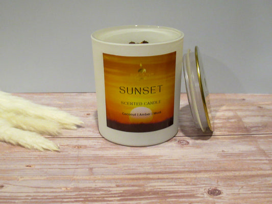 The luxury Sunset candle 15 oz white glass jar.