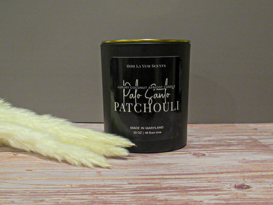 Palo Santo Patchouli luxury candle 15 oz black glass jar.