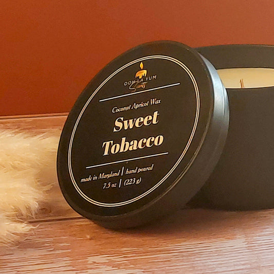 Sweet Tobacco candle in an 8 oz round black candle jar.