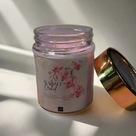 Jar of sea salt with a floral label on a light background