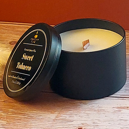 Sweet Tobacco candle in an 8 oz round black candle jar.