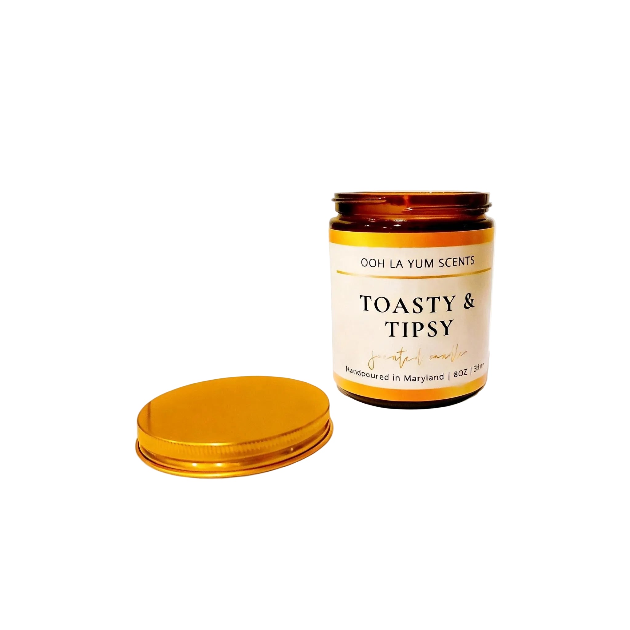 Candle jar labeled 'Toasty & Tipsy' by Ooh La Yum Scents on a white background