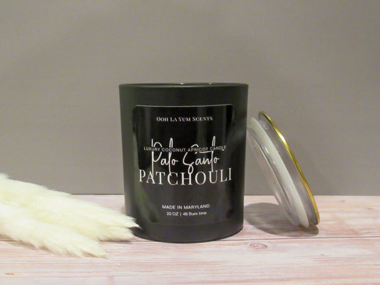 Palo Santo Patchouli luxury candle 15 oz black glass jar.