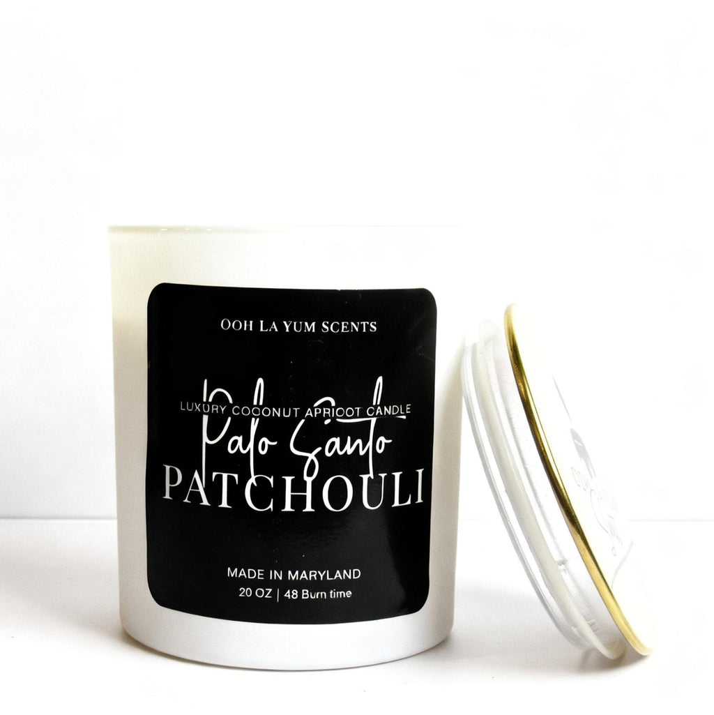 Candle with a black label on a white background