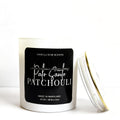 Candle with a black label on a white background