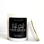 Candle with a black label on a white background