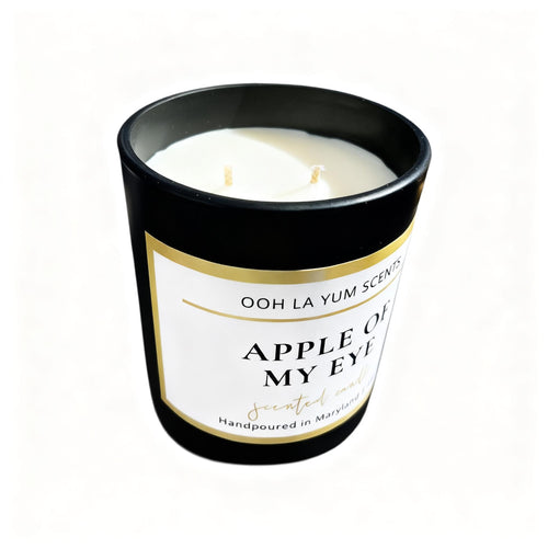 A Black Jar with a label 'Apple of My Eye'. 