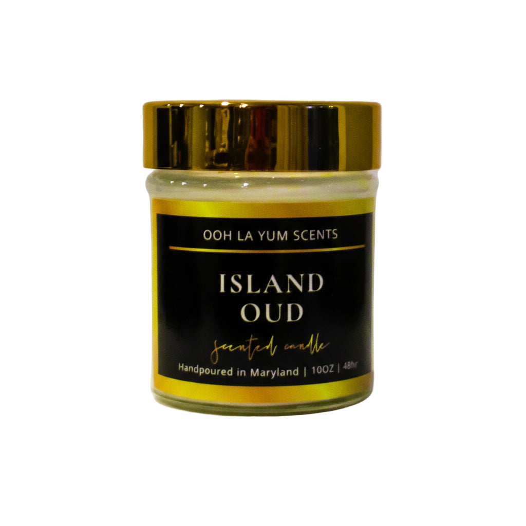 Jar of 'Island Oud' candle by Ooh La Yum Scents on a white background
