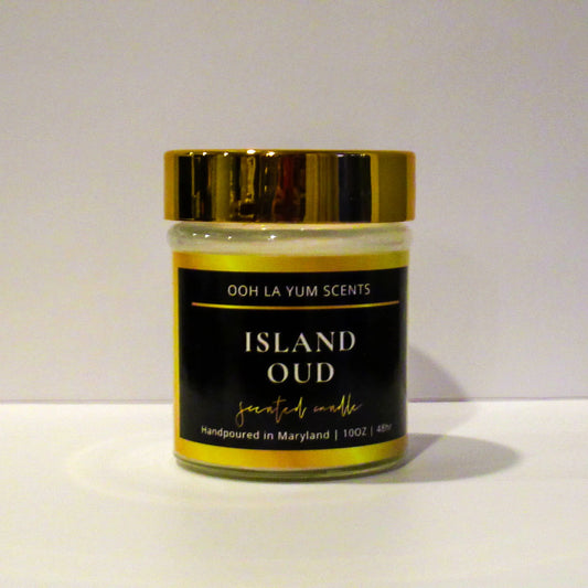 Jar of 'Island Oud' candle by Ooh La Yum Scents on a white background
