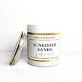 Candle jar labeled 'Sunkissed Sands' by Ooh La Yum Scents on a white background