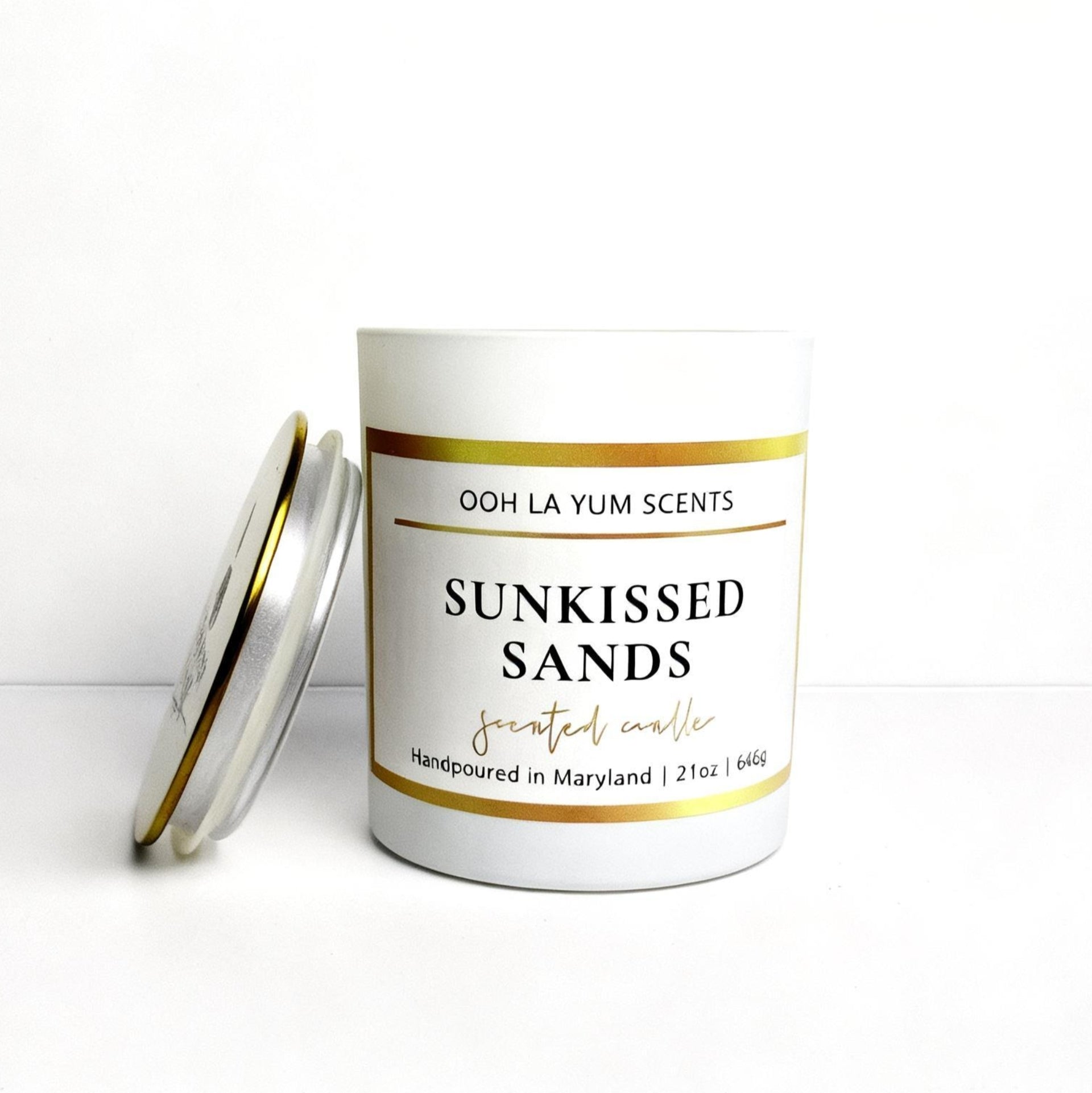 Candle jar labeled 'Sunkissed Sands' by Ooh La Yum Scents on a white background
