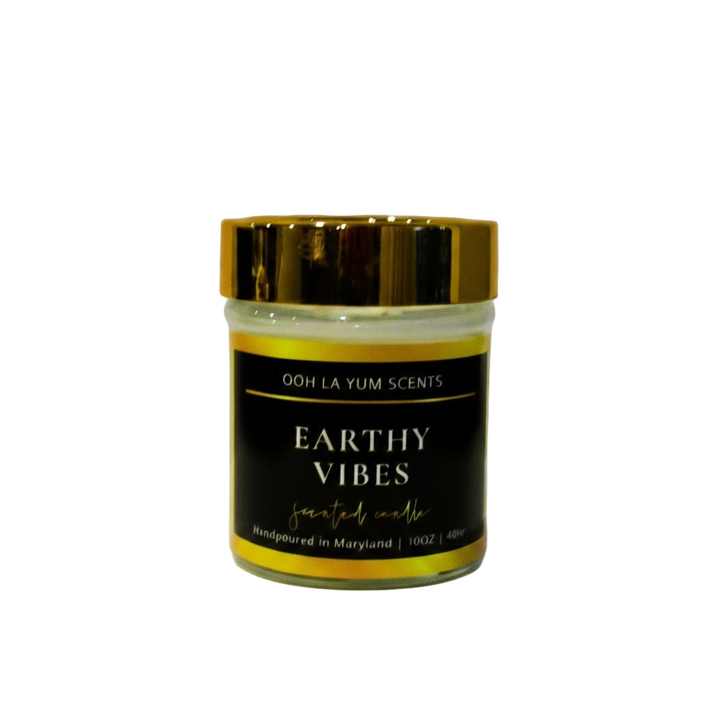 Candle jar labeled 'Earthy Vibes' by Ooh La Yum Scents on a white background